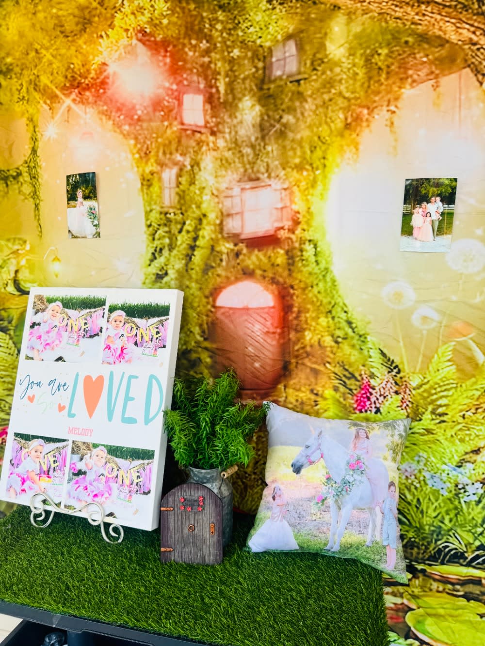 Unicorn party decorations and photo area for a magical outdoor birthday celebration